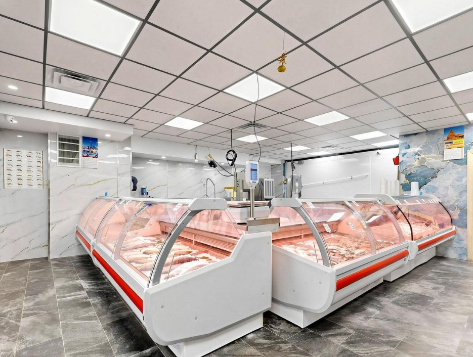 Fresh fish and meat counters at Delta Market