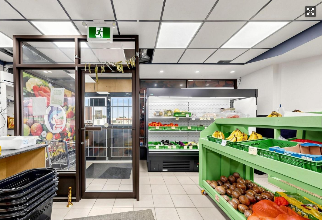 Delta Market entrance with produce display